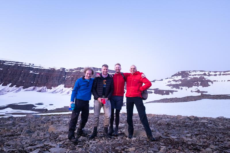 three computer programmers and one
architect standing outside usual programming and architecture habitats