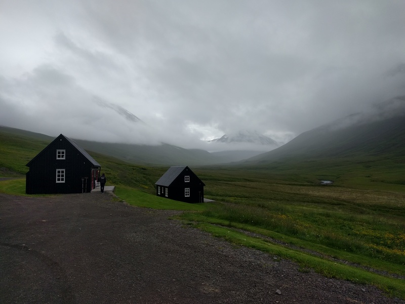 lodge houses with mountains behind